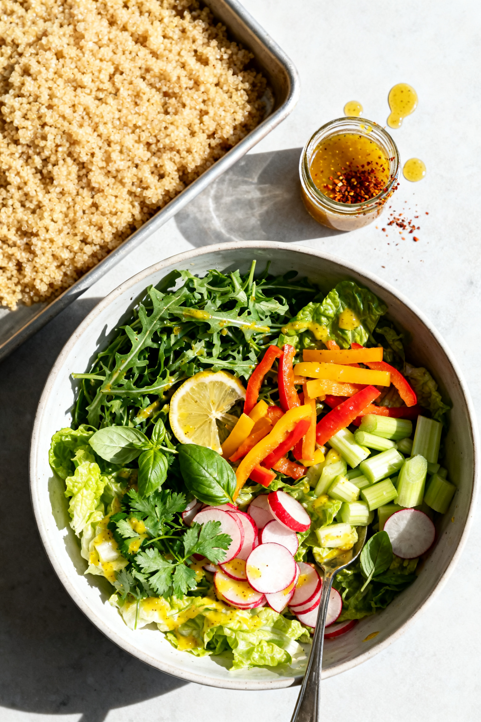 Summer Dinner Recipes — Leftover Roast Beef Empty Fridge Fix - A Quick, Bright Meal From What You’ve Got Cooking process: Overhead shot of the “toss stage” in a large mixing bowl—arugula and romaine