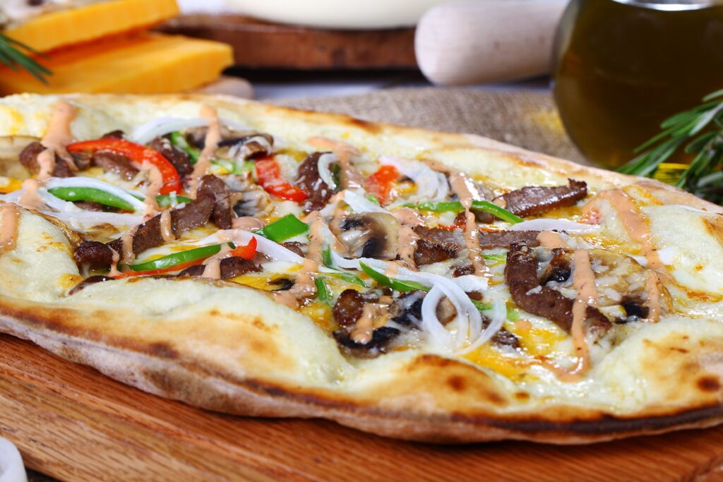 pexels peno33 31064272smoky steak and peach flatbreads