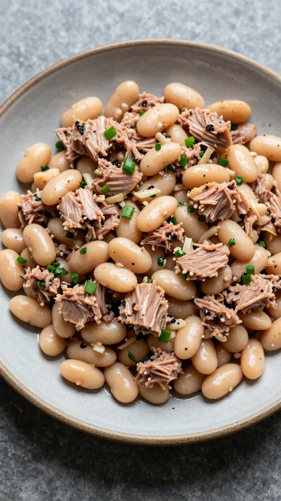 tuna and white bean salad on rustic plate